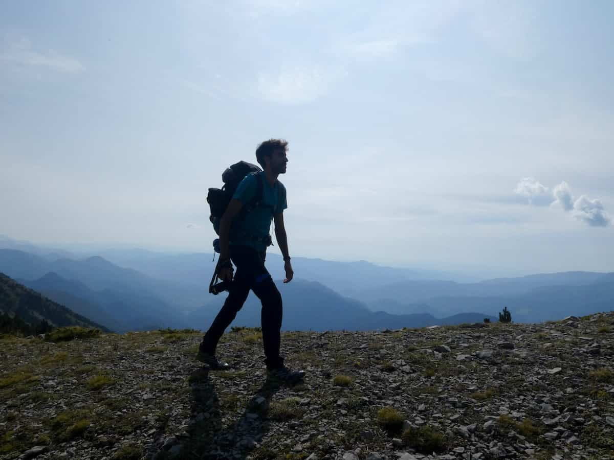 A person hiking the Cavalls del Vent route