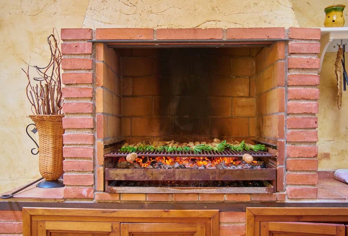 Calçots being grilled in a bbq