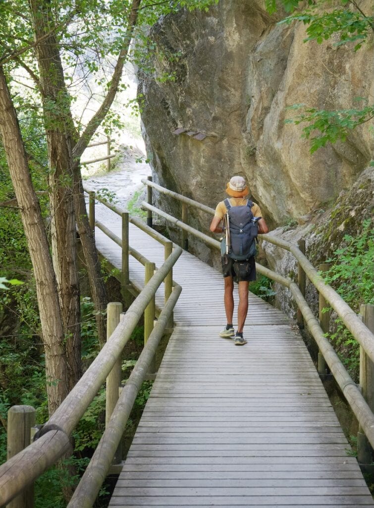 A hiker in the Camí Ral route