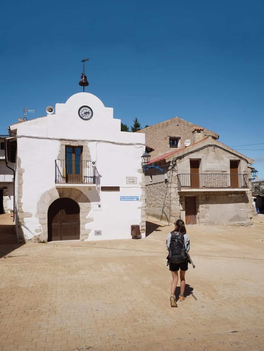 A hiker exploring the isolated village of Coratxà