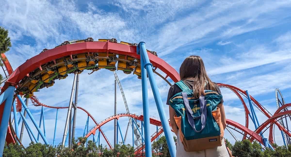 A woman staring at the Dragon Khan in Port Aventura