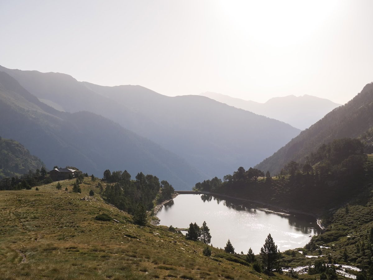 Views of Estany de les Truites and Comapedrosa hut from Basses de les Granotes