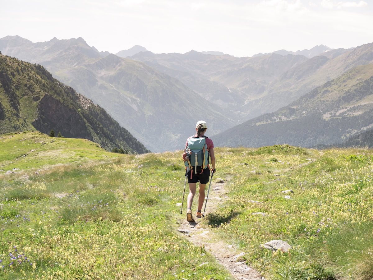 A person hiking in Sorteny Valley during the Coronallacs route