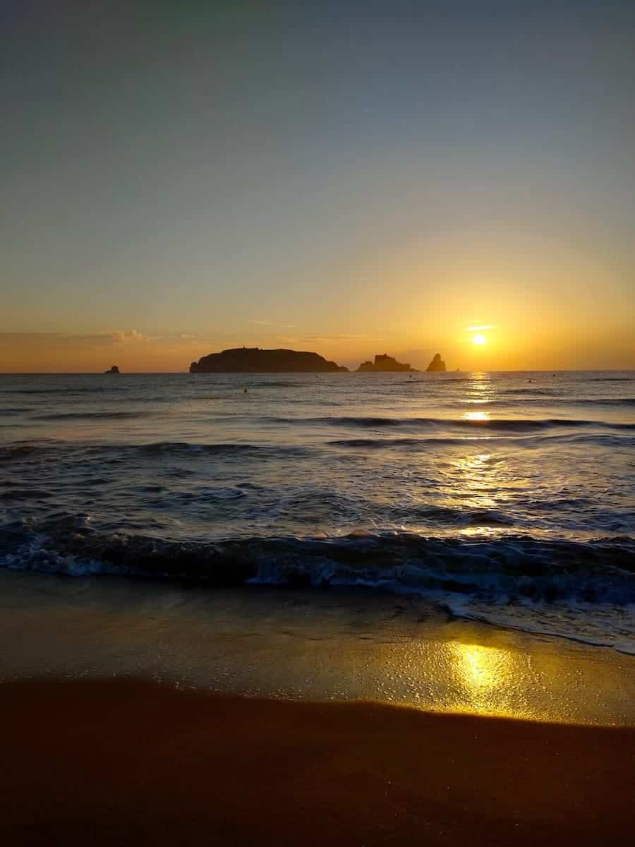 Sunrise from the beach looking at the Medes Islands, one of the best things to do in Costa Brava