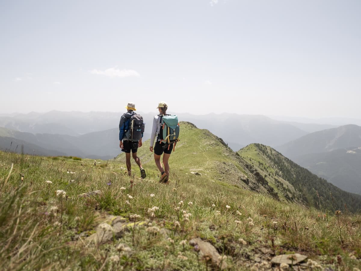 Hiking in a mountain ridge in the Comapedrosa Natural Park