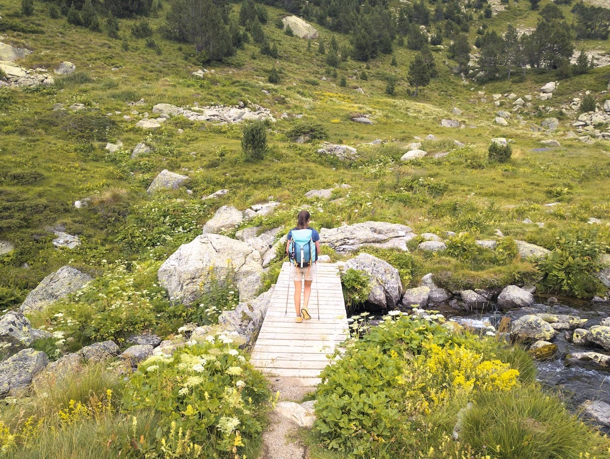 Crossing the Siscaró River during the Coronallacs hike