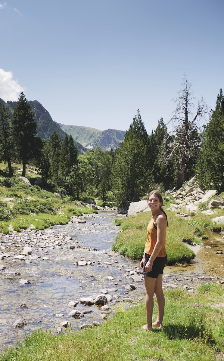 Taking a break near the Madriu River during the Coronallacs hike