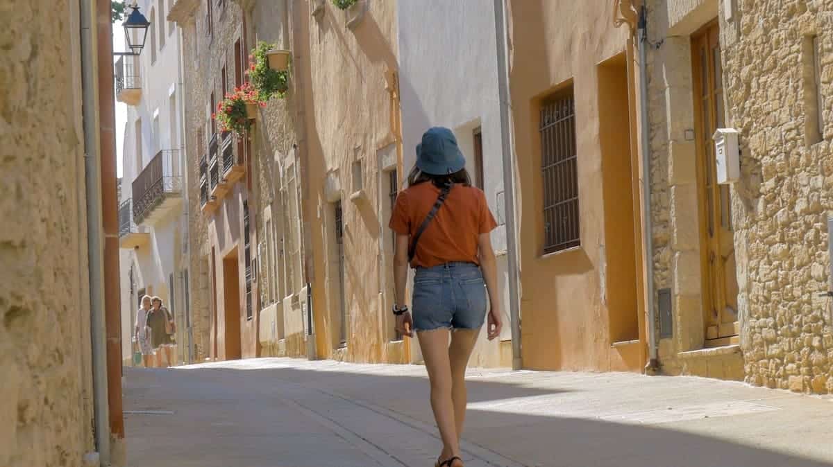 A person walking around Begur's historic centre