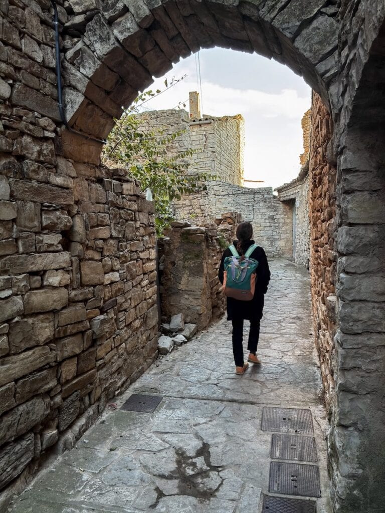 A person strolling through Montfalcó Murallat