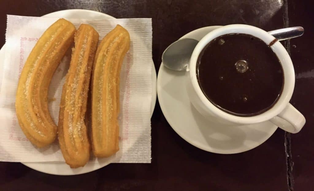 A cup of hot chocolate and a dish of xurros, a good way to start the second day of our Barcelona 2-day itinerary